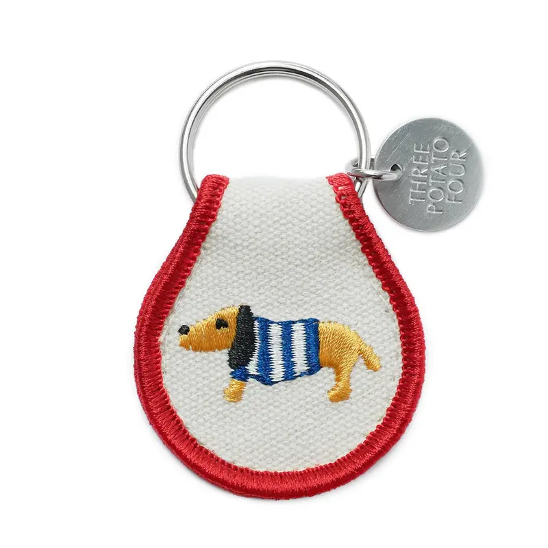 Cozy Sweater-Wearing Dog Keychain