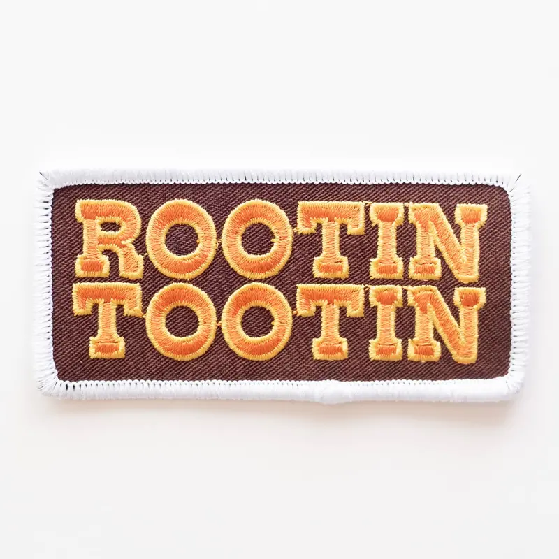 Rootin’ Tootin’ Embroidered Patch – Playful Retro Western Accent